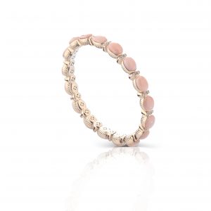 Bracciale elastico in oro 18 kt, corallo rosa e diamanti
